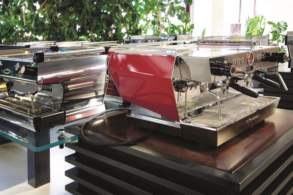 A red coffee machine from La Marzocco