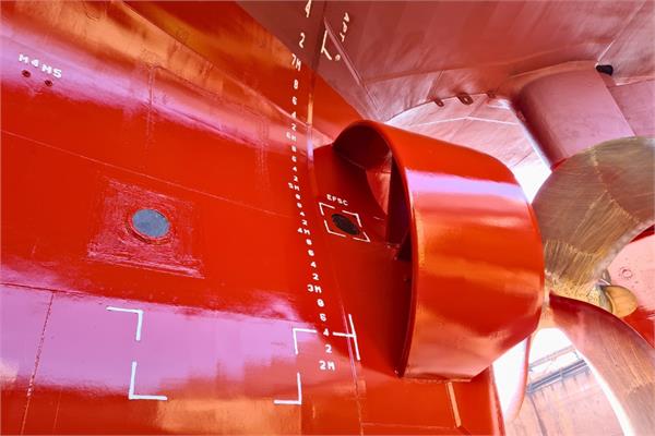 A ship coated in red with PPG coatings